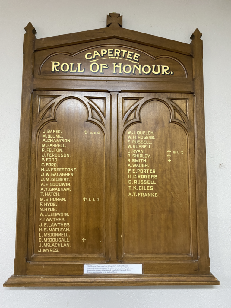 Picture of the St Augustine’s Anglican Church Capertee Roll of Honour that served. Name columns are in the shape of a church window. It lists 38 people.