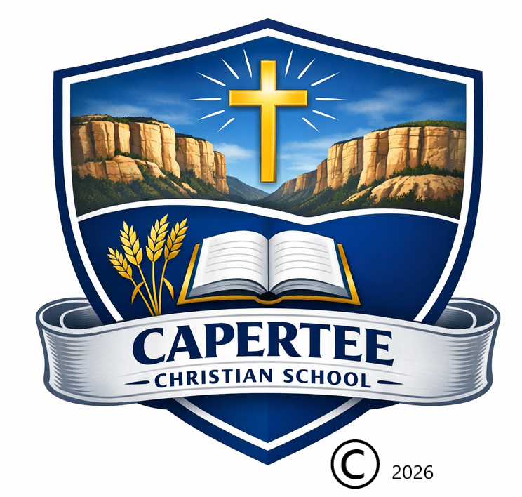 Capertee Christian school emblem with A blue shield featuring golden sandstone cliffs with a radiant cross above them, and an open book and wheat sheaf in the lower section. A silver banner below the shield reads ‘Capertee Christian School’ with copyright icon and 2026 at the bottom.